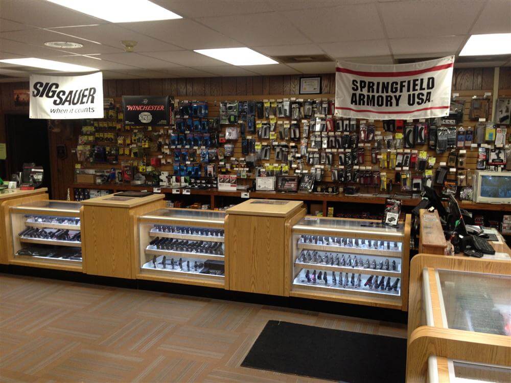 Handguns, shotguns, and rifles available for purchase at Wisconsin firearms store and indoor range